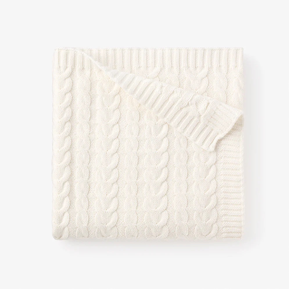 Whisper white horseshoe cable blanket